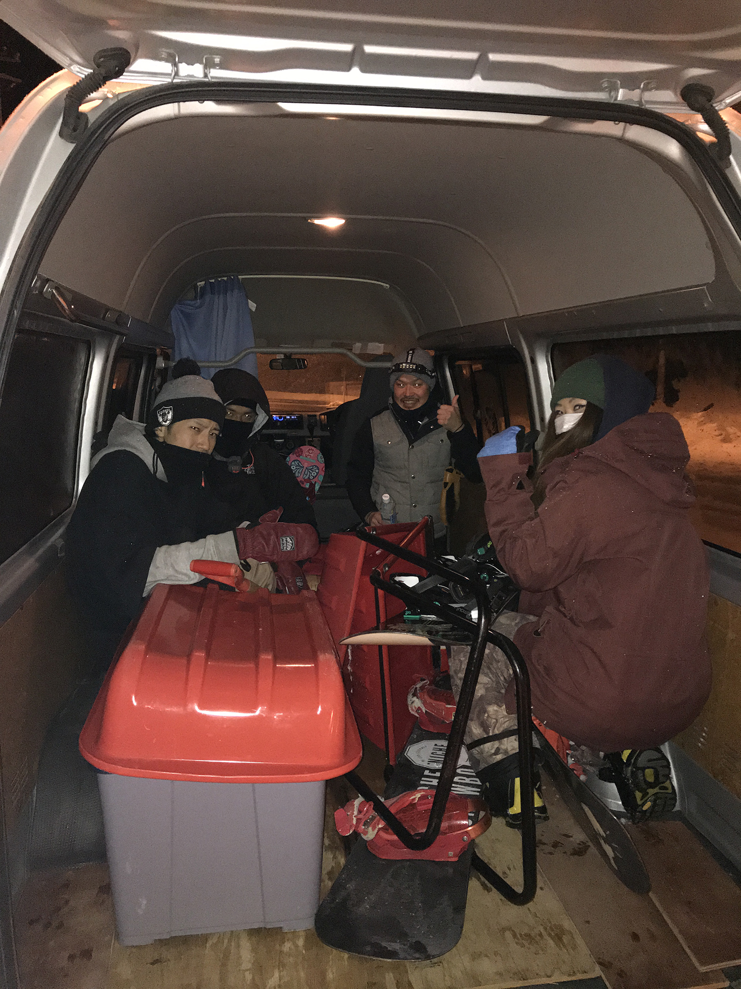 Crew boarding the van and waiting for the weather to recover